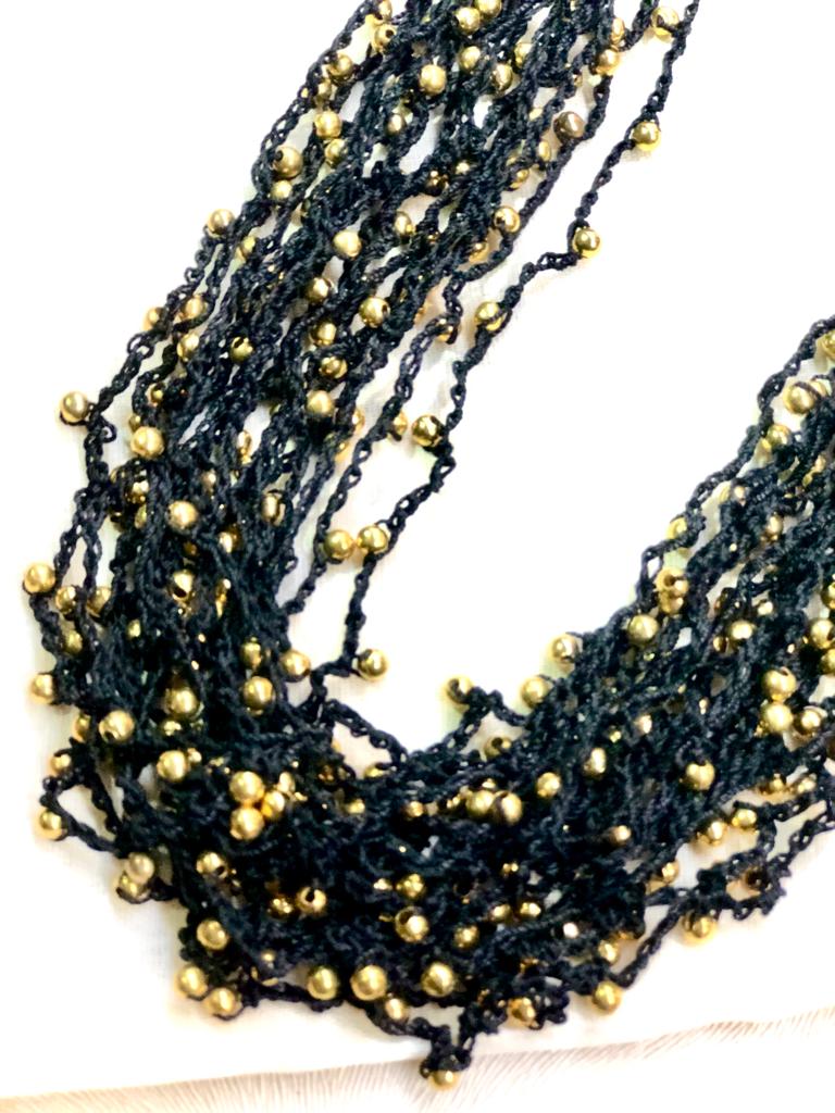 Multi-layered neckpiece with beads